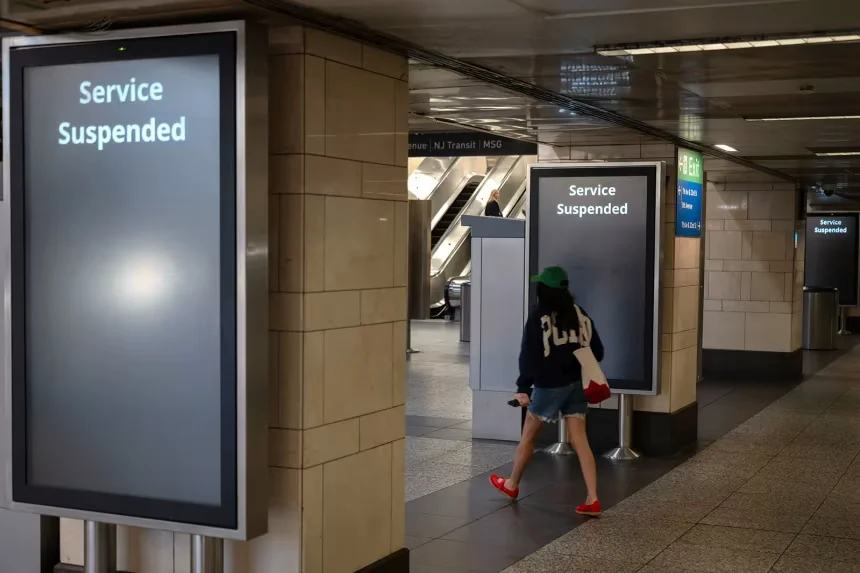 An information board displaying the suspension of Long Island Rail Road service due to a strike, at Penn Station in New York, on May 16, 2026. Victor J. Blue/Bloomberg/Getty Images