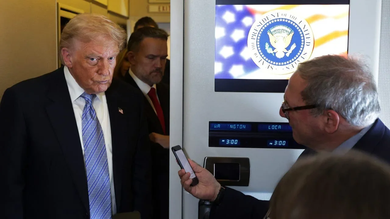 President Donald Trump briefs reporters after he concluded his trip to Beijing aboard Air Force One on May 15, 2026 as he returns to the United States. (Photo by Alex Wong/Getty Images)