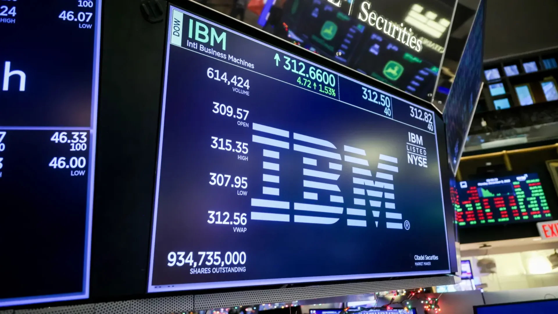 International Business Machines Corp. (IBM) signage on the floor of the New York Stock Exchange (NYSE) in New York, US, on Monday, Dec. 8, 2025.