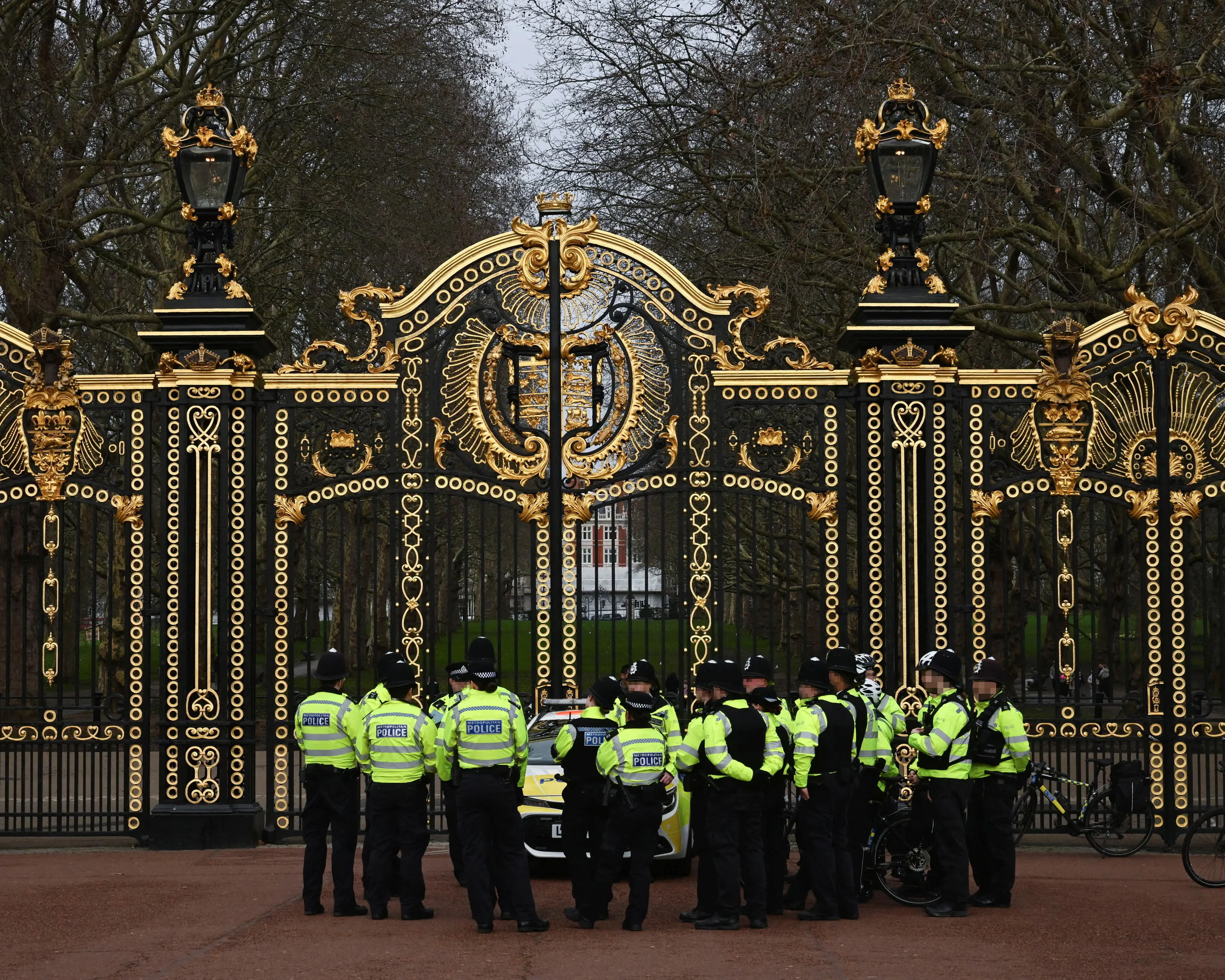 Police officers outside the gate of Buckingham Palace in February 2026. Photograph: Reuters