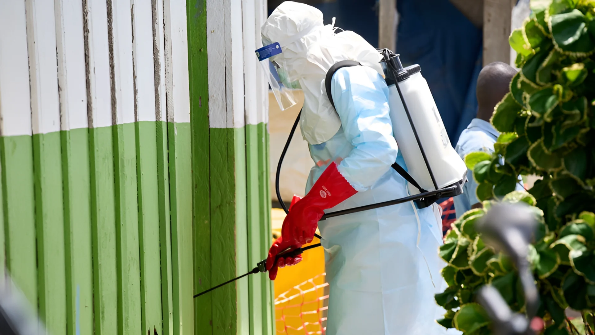 A health worker disinfects an Ebola treatment center in Rwampara, Congo, May 21, 2026. | Dirole Lotsima Dieudonne/AP
