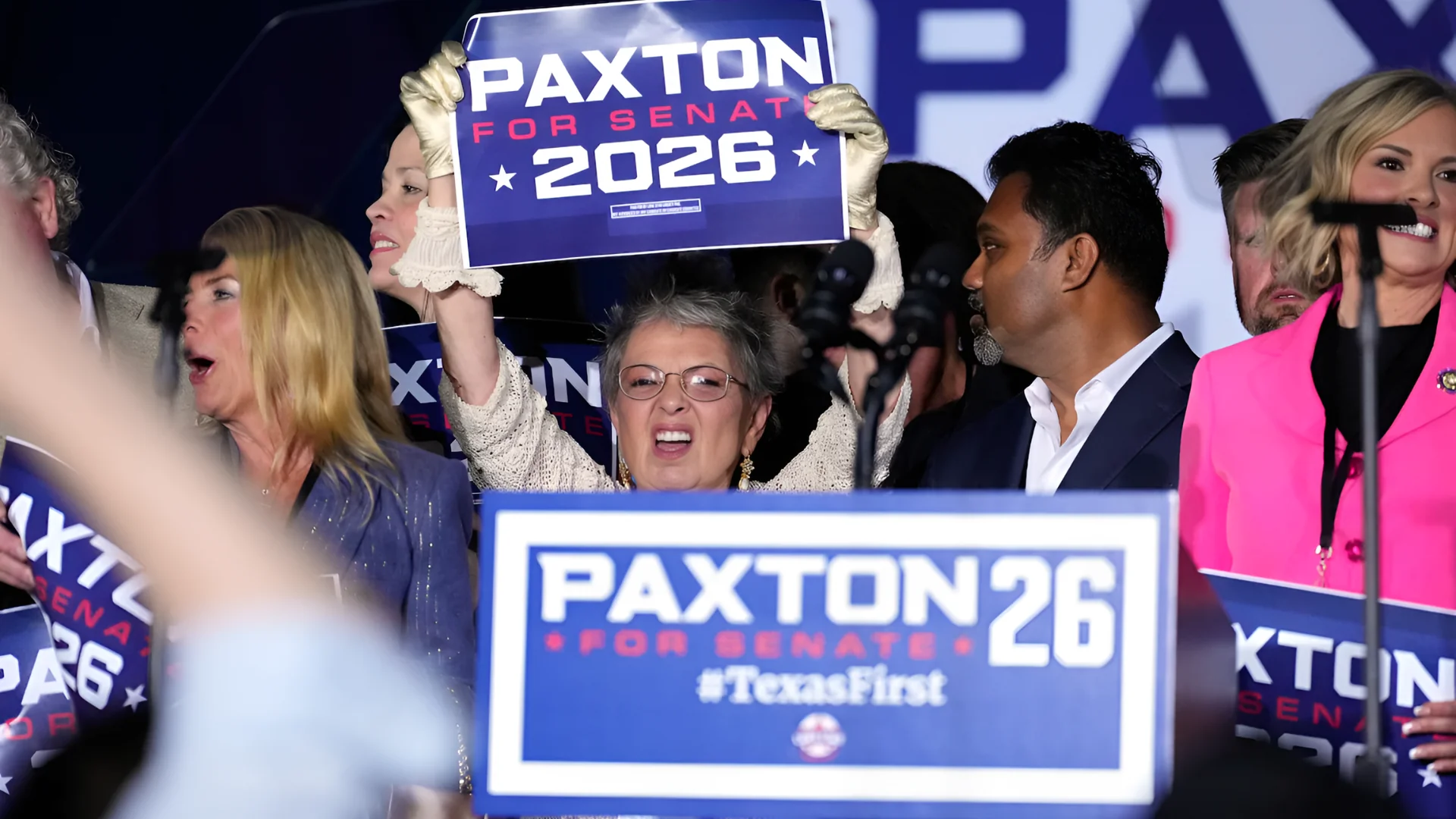 Supporters at an election-night event in Plano, Texas, celebrate after state Attorney General Ken Paxton, a Republican candidate for U.S. Senate, won the nomination on Tuesday. (Tony Gutierrez/AP)