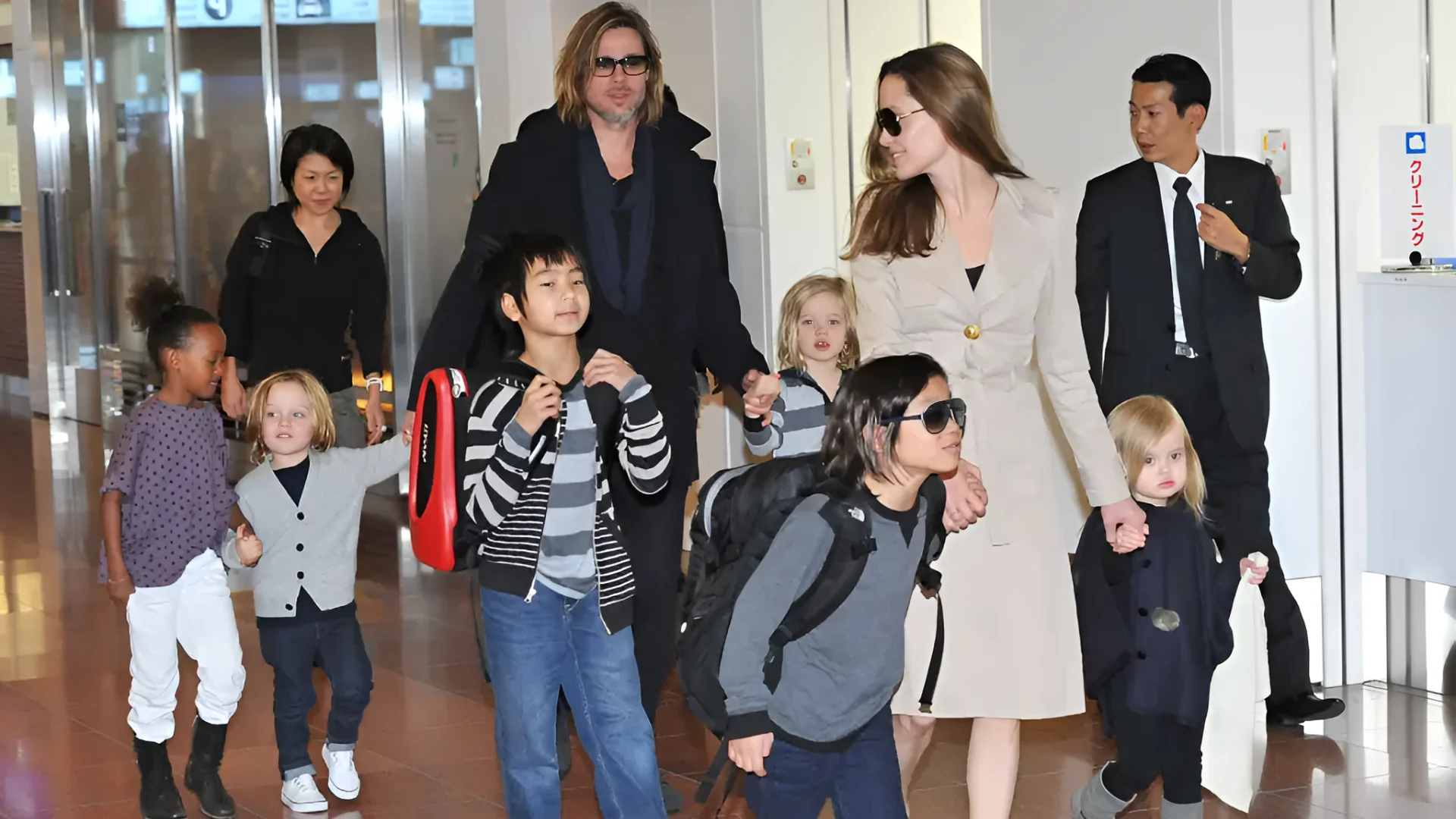 Brad Pitt and Angelina Jolie, seen with their six children at Tokyo’s Haneda International Airport in November 2011, were together for a total of 12 years and married for two. WireImage