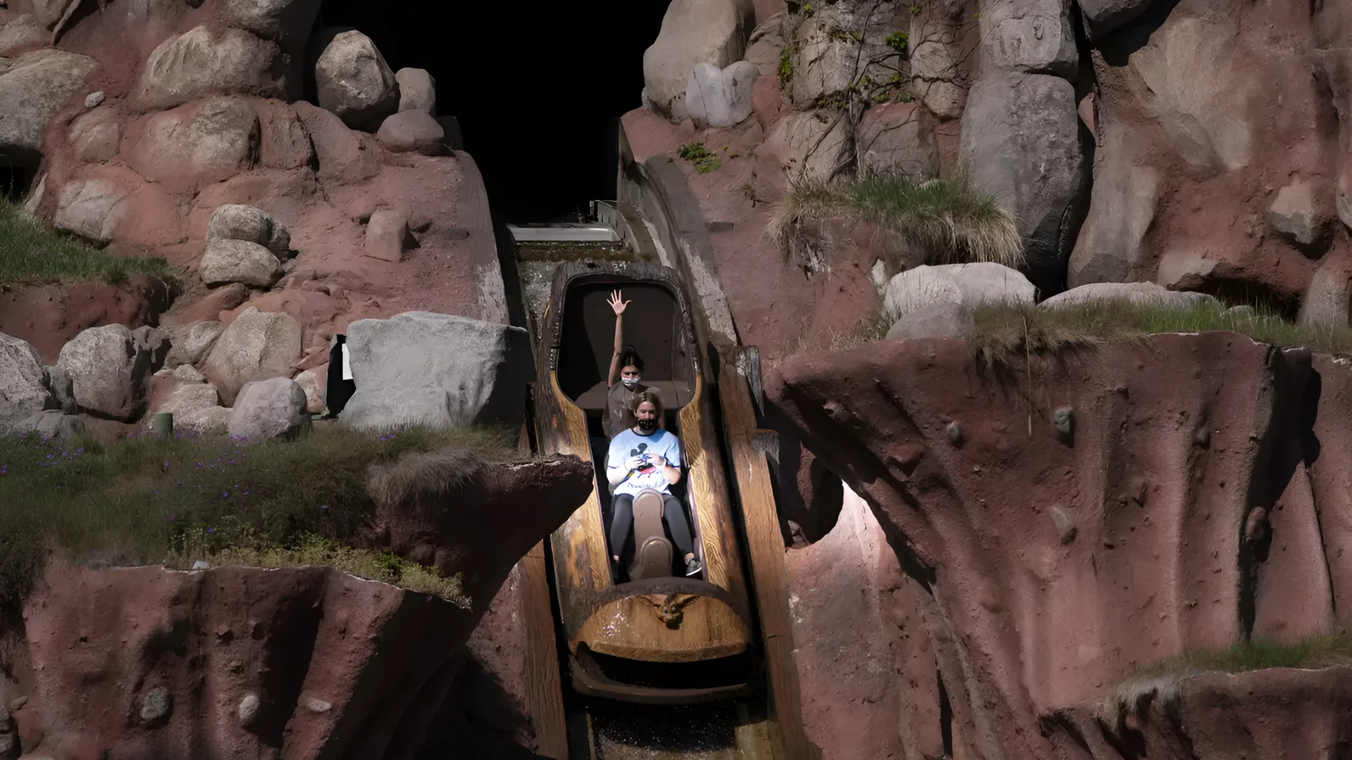 Guests ride Splash Mountain at Disneyland, an attraction that was replaced by Tiana’s Bayou Adventure. On Splash Mountai