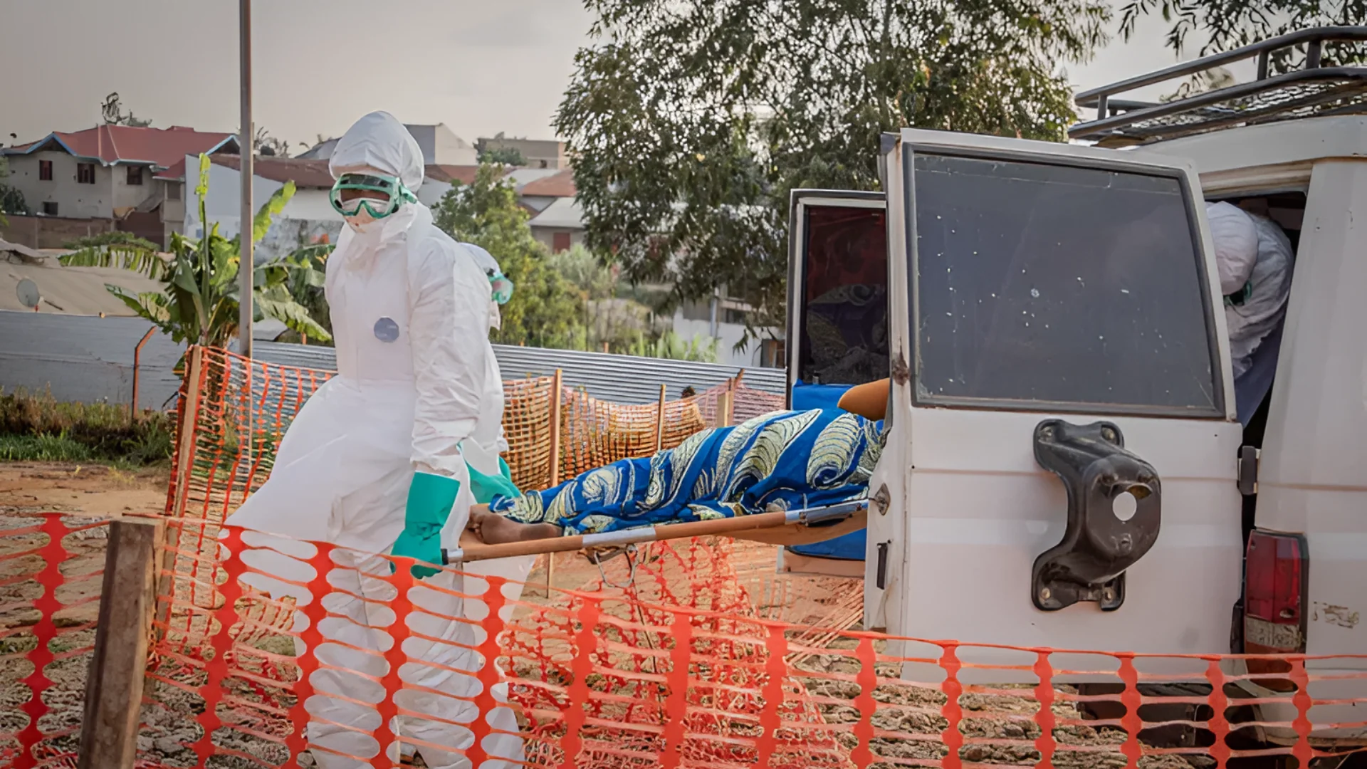 Healthcare workers carry a patient infected with the Ebola virus from an ambulance at the Ebola treatment centre in Bunia, Ituri, in the Democratic Republic of the Congo on June 23, 2026 [Benediction Murhabazi/AFP]