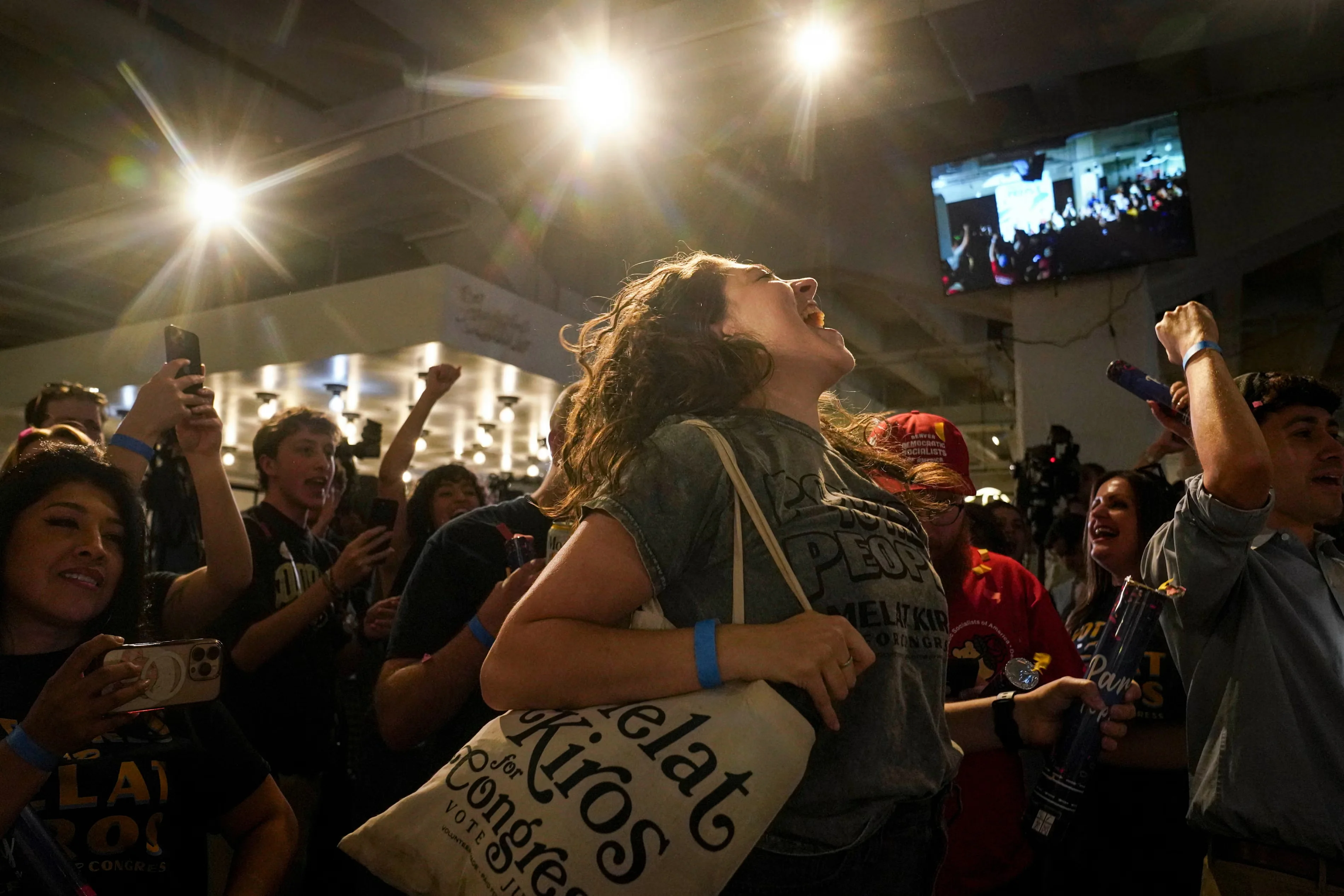 Celebrations after the first report of election results show Democratic congressional candidate Melat Kiros in the lead. Photograph: Rebecca Slezak/AP
