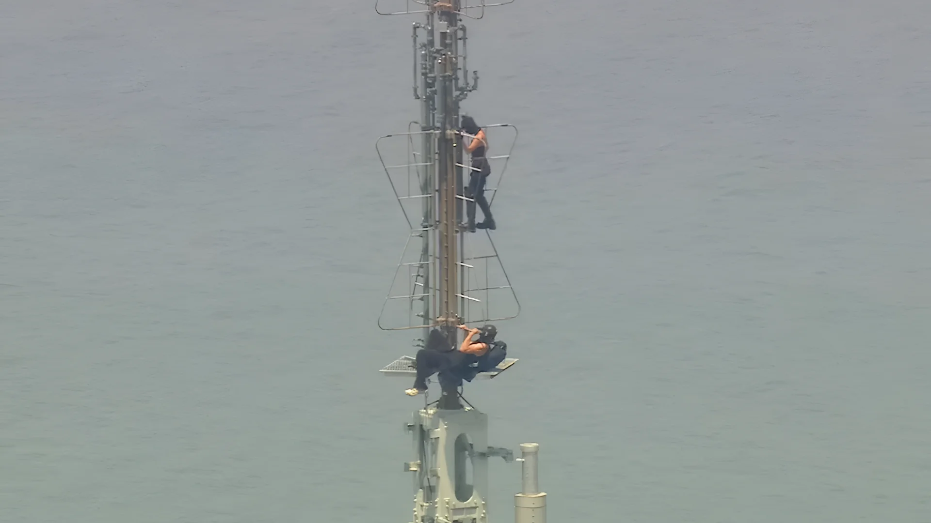 Angela Nikolau and Ivan Beerkus who got to the top of the Empire State Building climb down the tower's spire in New York