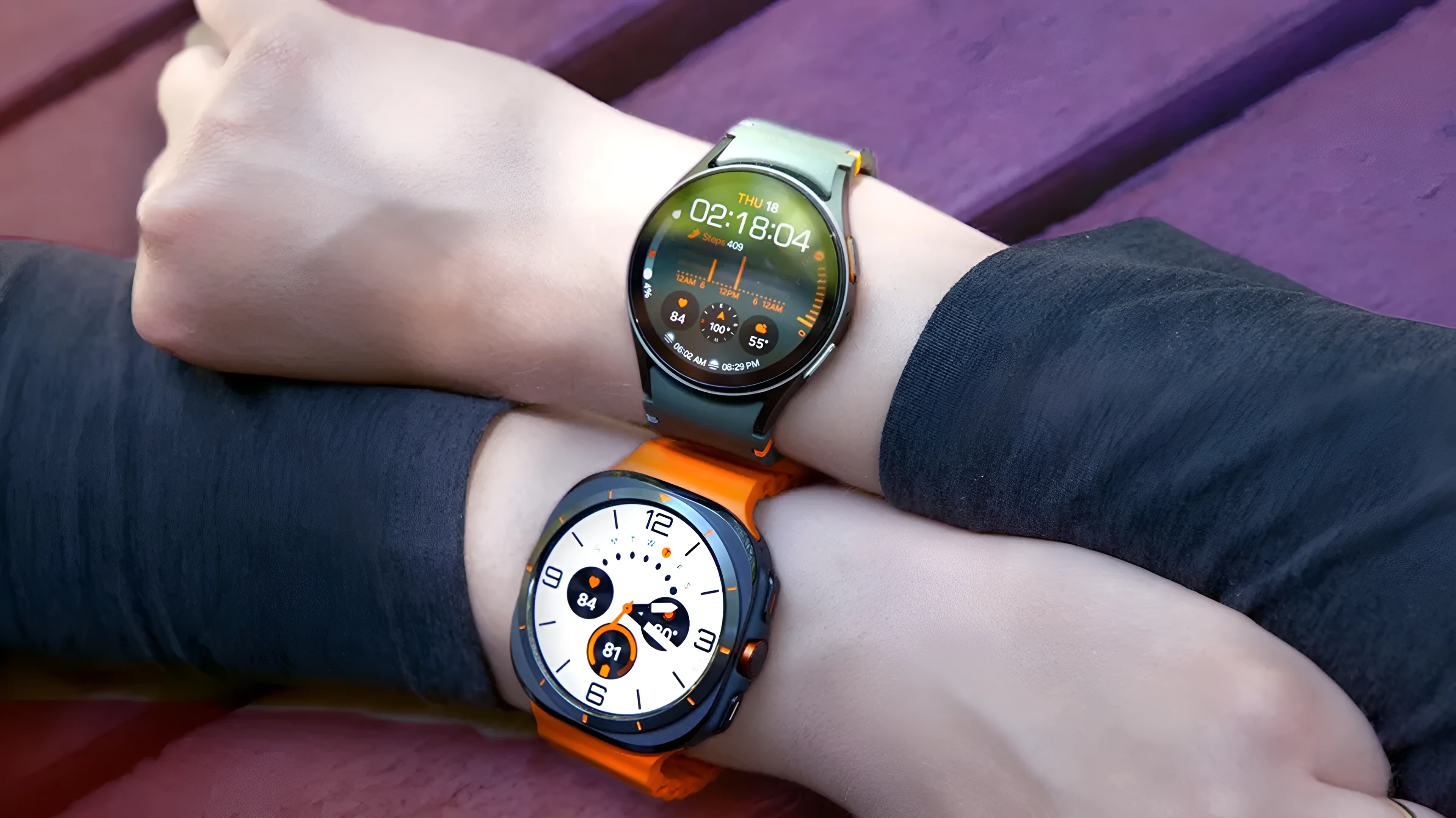 Two wrists feature two different smartwatches by Samsung. Photo: Celso Bulgatti/CNET