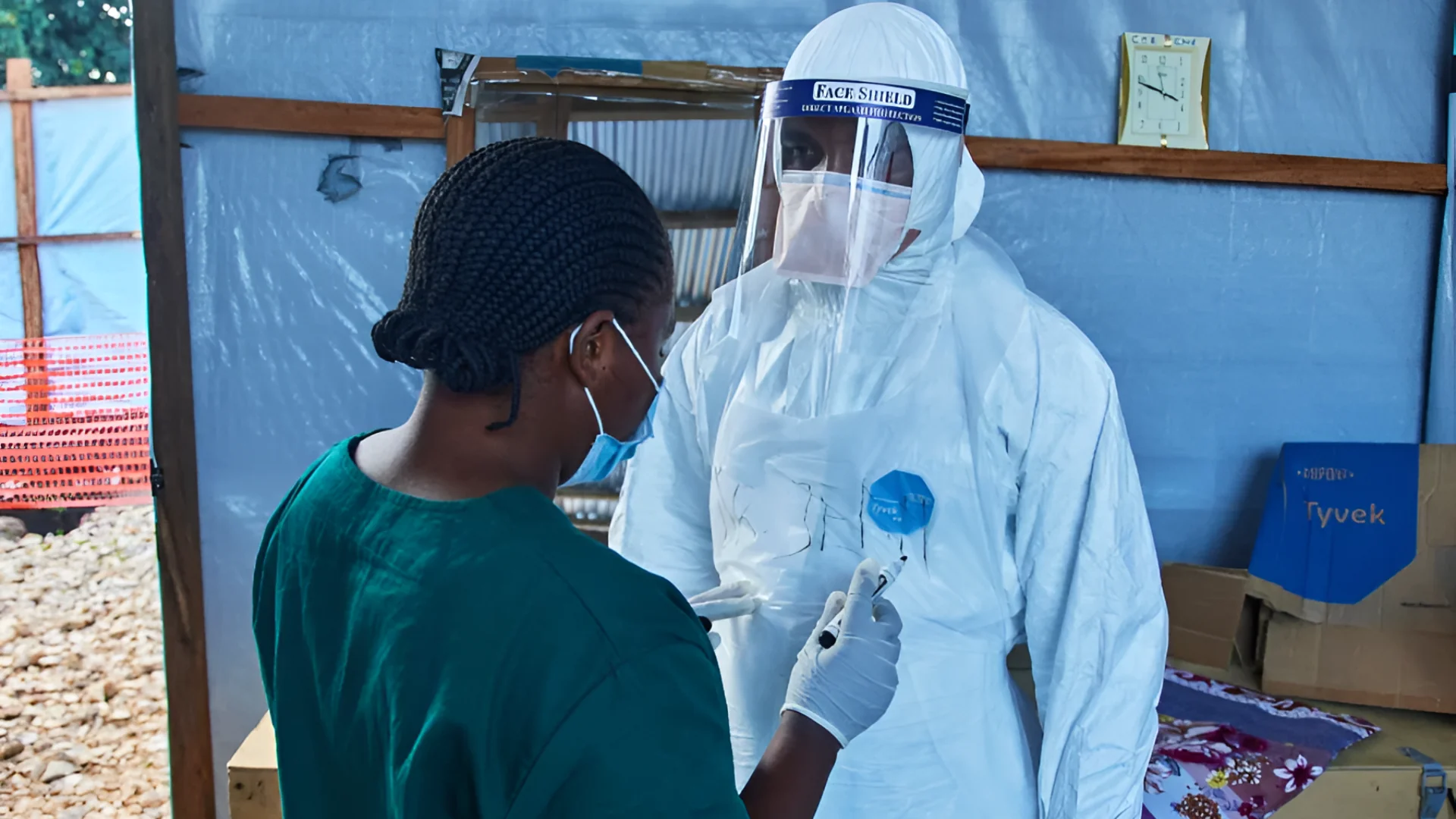 Health workers interact at the Evangelical Medical Center, in Bunia, eastern Congo, Friday, July 3, 2026, where Ebola clinical trials are scheduled to take place.  Dirole Lotsima Dieudonne/AP