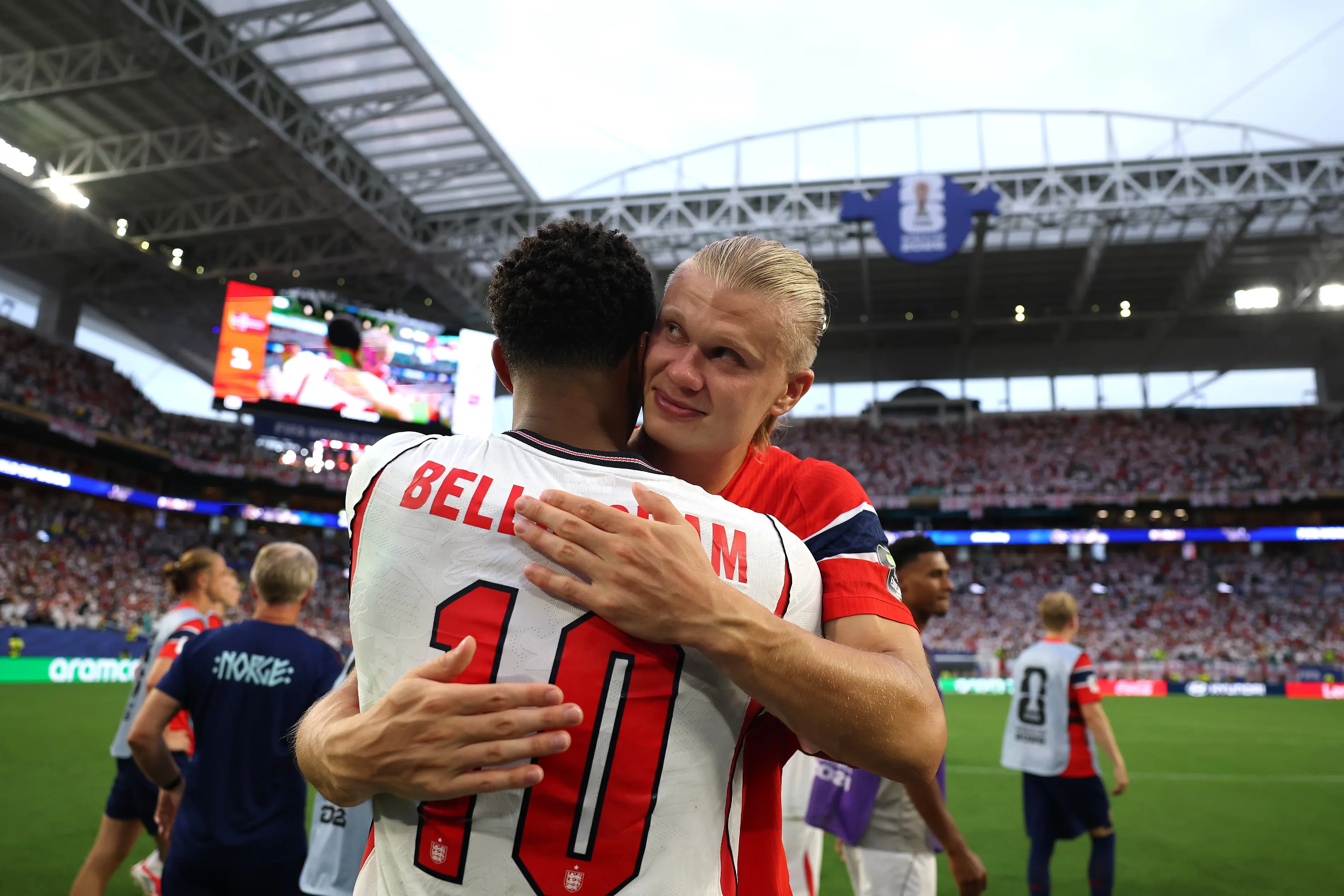 Erling Haaland congratulates Jude Bellingham on England’s win. The Norway striker had to go off in extra time. Photograph: Patrick Smith/Fifa/Getty Images