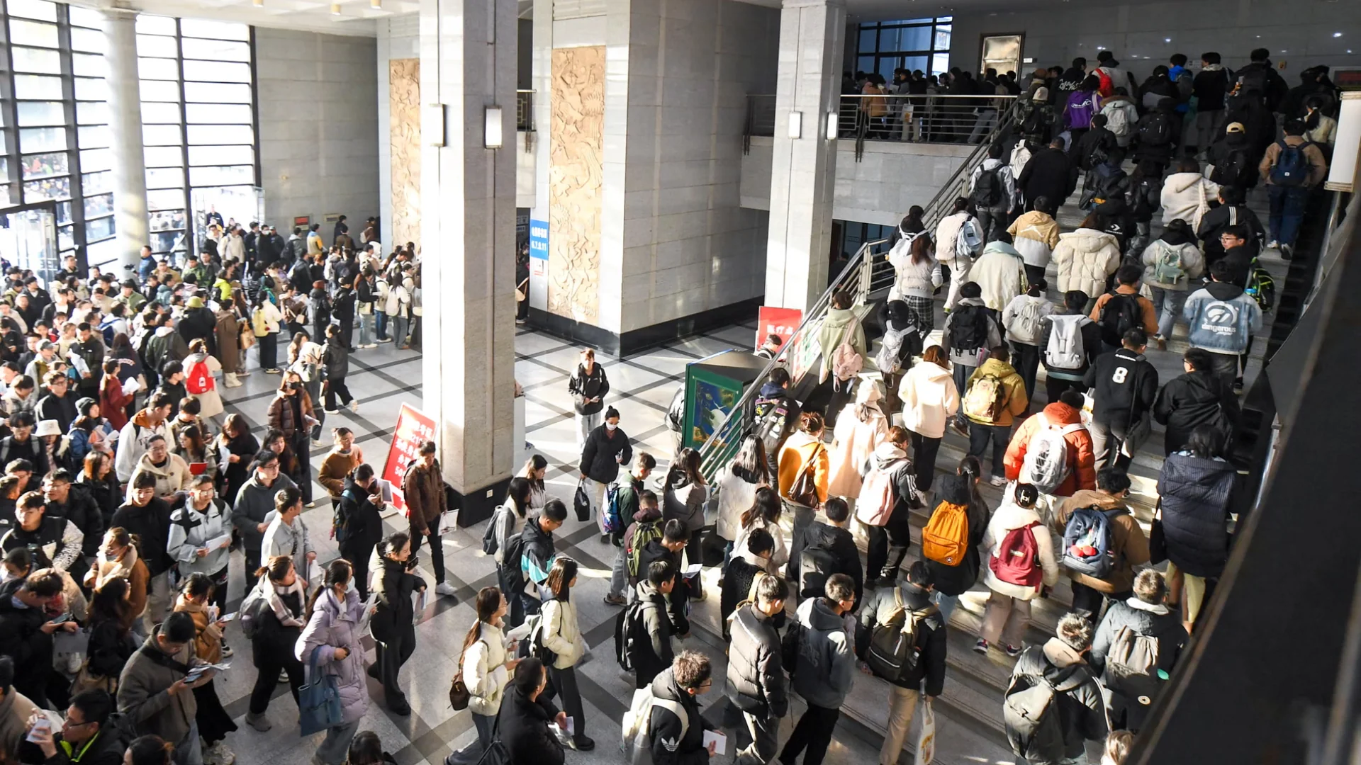 Candidates line up for the written exam for civil servants. Competition for vacancies is intense. Photograph: NurPhoto/G