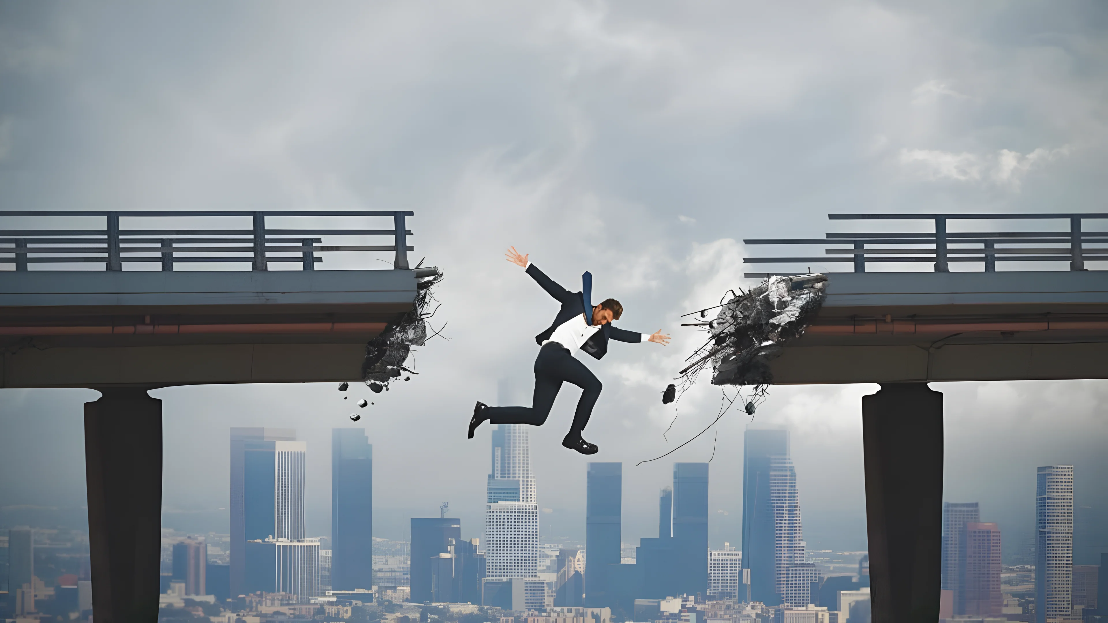 A businessman jumping across a gap in a broken bridge high above a city skyline. Credit: Federico Caputo