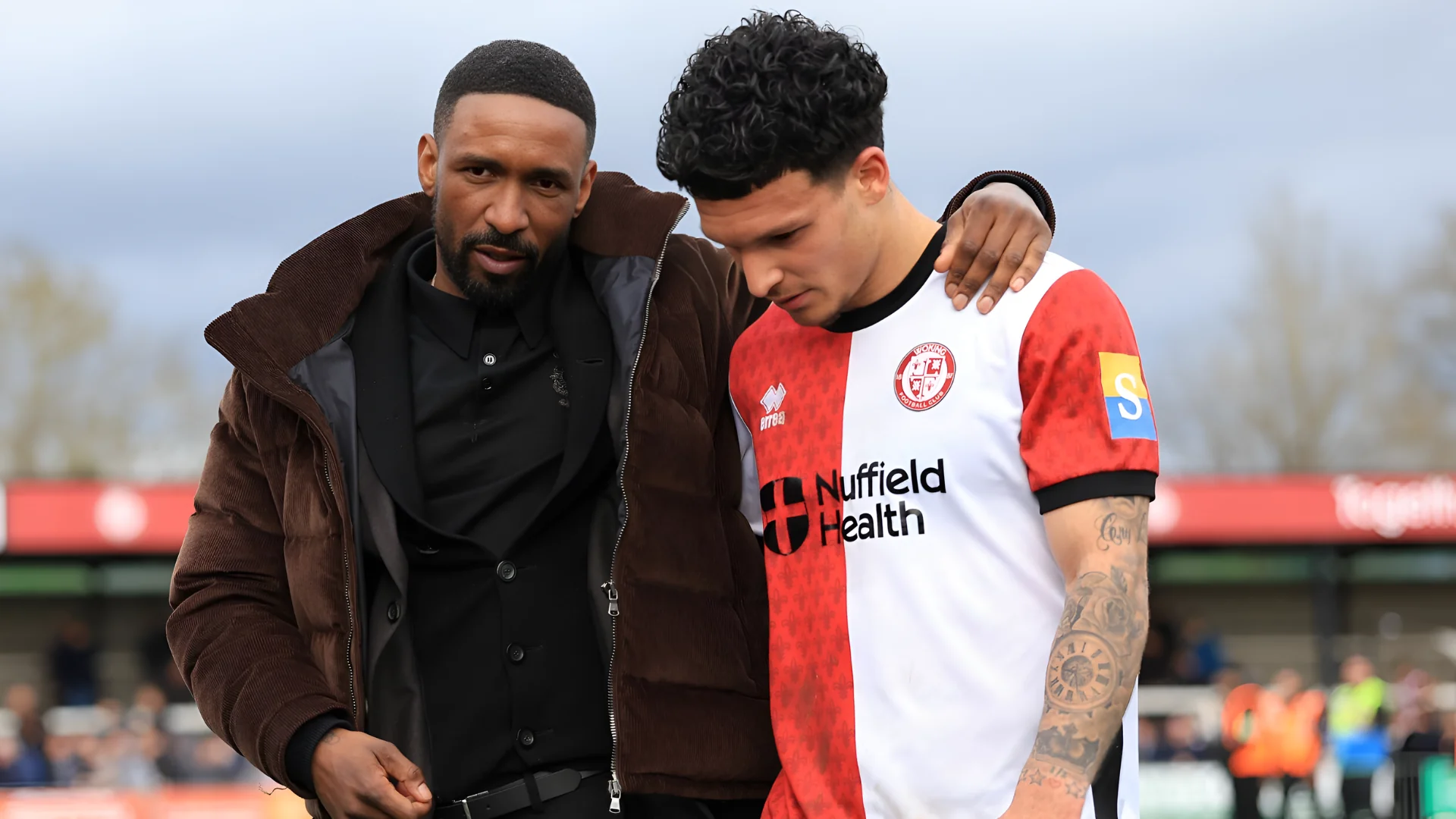 Jermain Defoe said it was impossible for him to continue as Woking FC head coach
