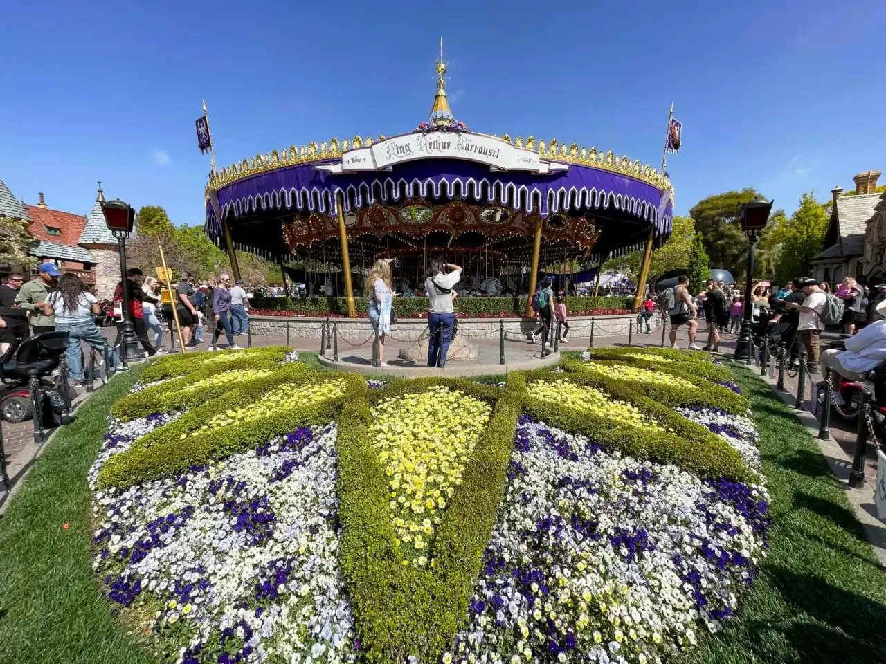 Flowers bloom around the Sword in the Stone in front of King Arthur Carrousel at Disneyland in Anaheim, CA, on Wednesday, March 16, 2022. (Photo by Jeff Gritchen, Orange County Register/SCNG)