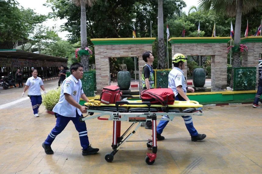Emergency personnel work outside of Debsirin Nonthaburi School, on the outskirts of Bangkok, Thailand, August 7, 2026. Chalinee Thirasupa/Reuters