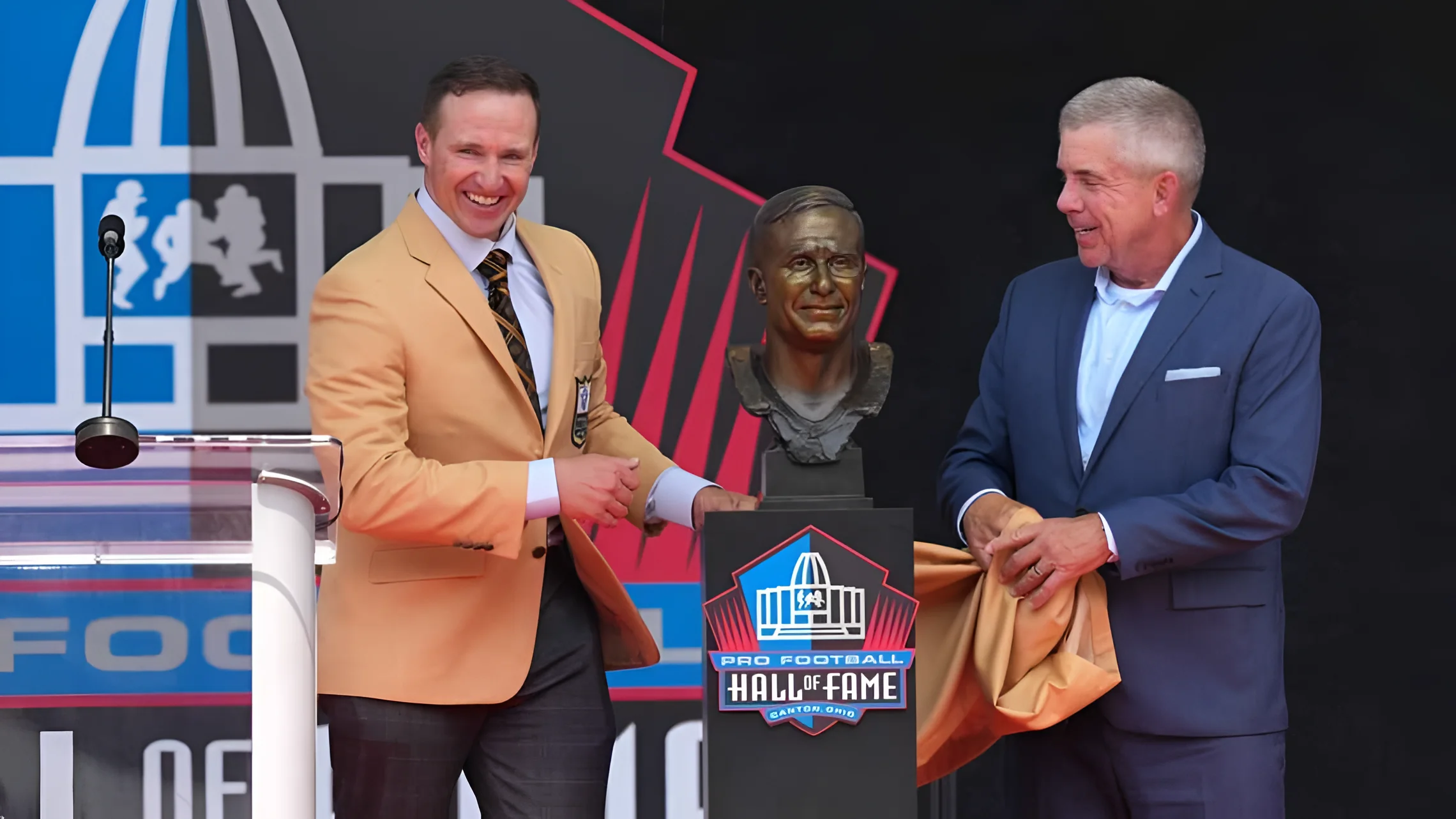 New Hall of Fame inductee Drew Brees reacts to his bust with former New Orleans Saints coach Sean Payton looking on. Kirby Lee-Imagn Images