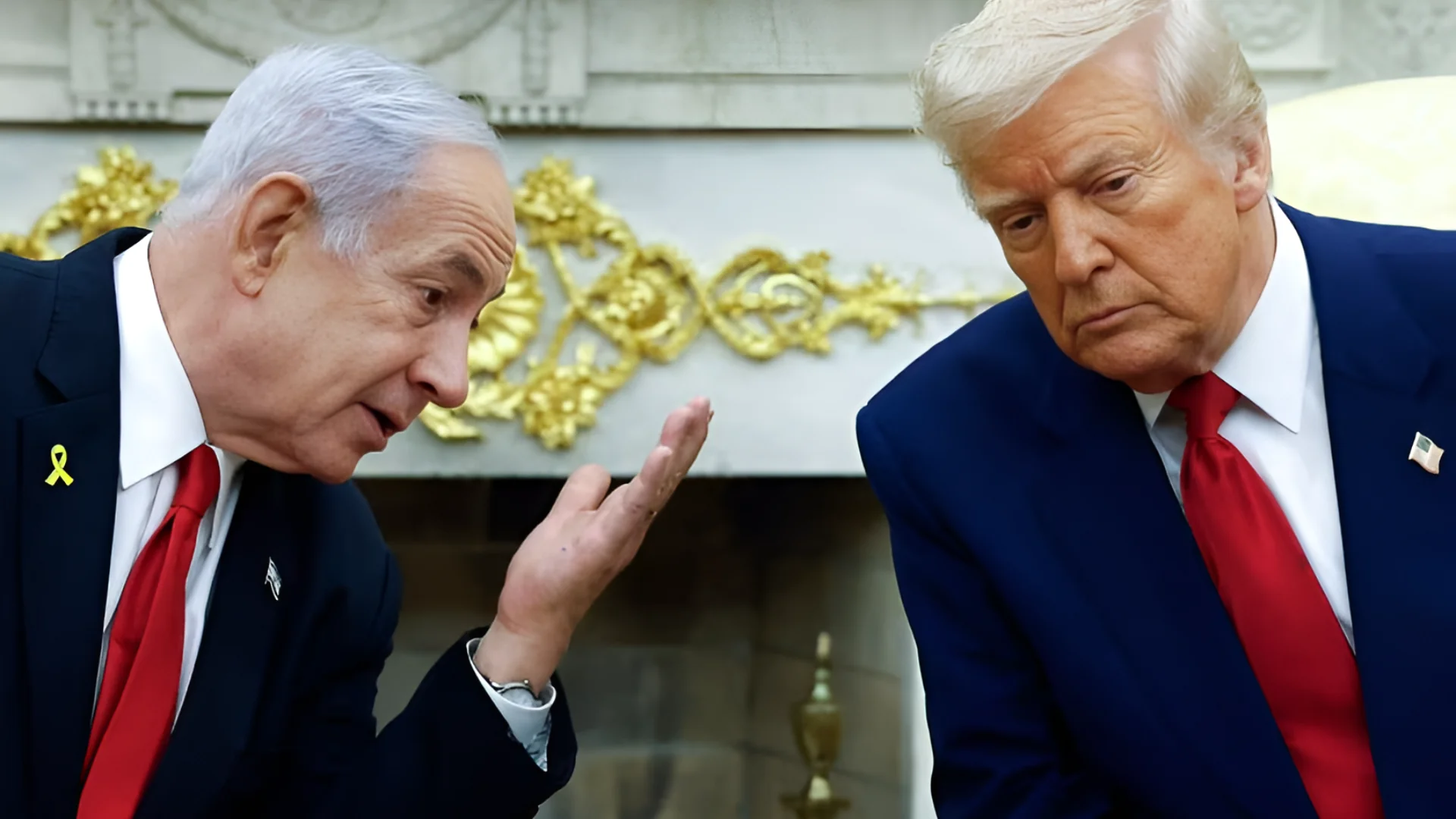 Israeli Prime Minister Benjamin talks to US President Donald Trump during a meeting in the Oval Office of the White Hous