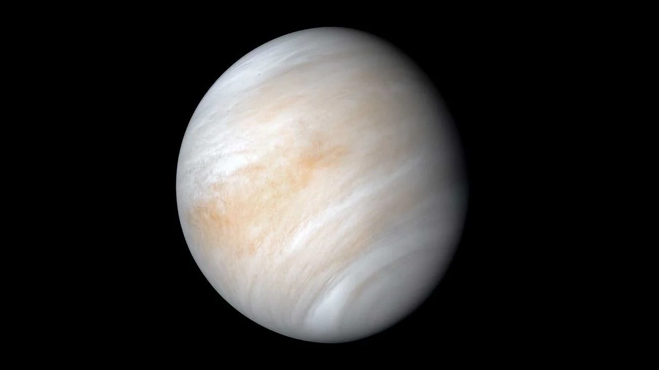 Reprocessed view of Venus enveloped in dense cloud layers captured by Mariner 10. Photo: NASA.
