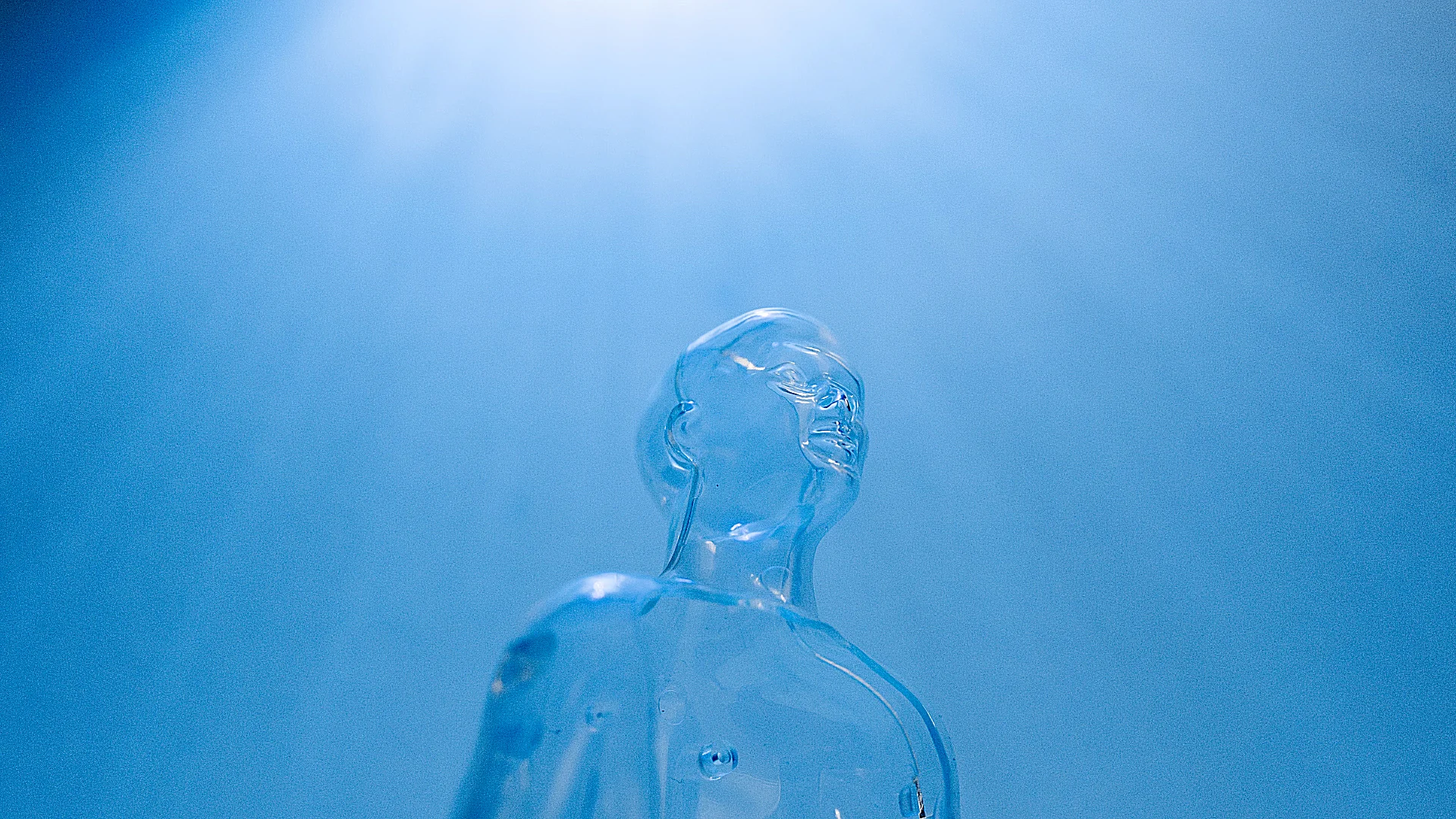 A minimalist translucent geometric shape set against a clear blue sky representing future technology. Photo: Tara Winste